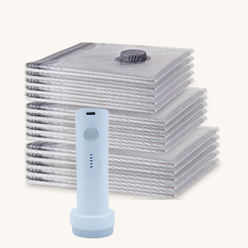 Orderly vacuum storage bags with electric pump on clean background